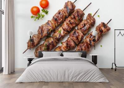 Delicious lamb kebab, isolated on a white background, showcasing a top-down view. Perfectly grilled and seasoned, this dish highlights the succulent, flavorful meat and savory spices, making it an app Wall mural