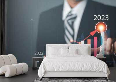 Business planning, analysis and development company Future growth 2022 to 2023. businessman calculates financial data for long-term investments. Wall mural