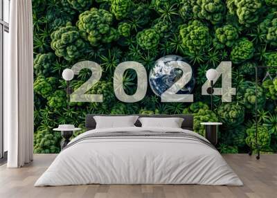 Aerial view of lush green forest forming a globe with the year 2024 prominently displayed, symbolizing environmental awareness. Earth Day 2024 Wall mural