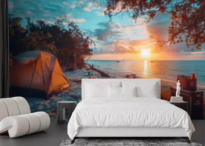 The beach camping scene at sunset. Wall mural