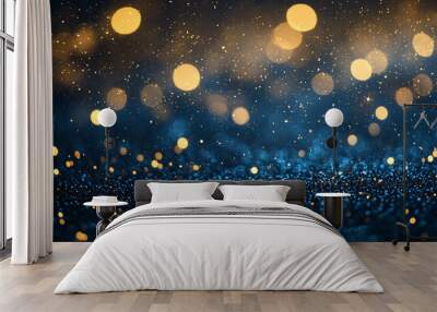 A close-up of shimmering gold and blue bokeh lights against a dark background, creating a festive atmosphere Wall mural