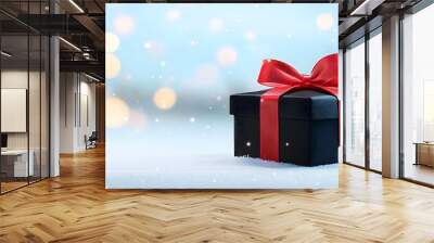 A beautifully wrapped gift box with a red ribbon on a snowy background, perfect for holiday celebrations and festive occasions. Wall mural