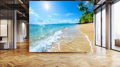 Sandy beach with clear blue water and palm trees under a bright sunny sky Wall mural