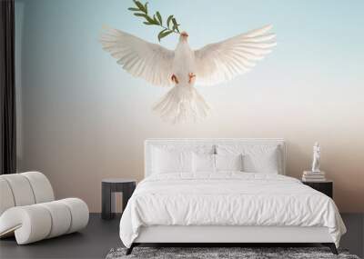 white dove or white pigeon carrying olive leaf branch on pastel background and clipping path and international day of peace  Wall mural