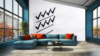 A simple checklist with black checkmarks, minimalistic flat design, isolated on white background Wall mural