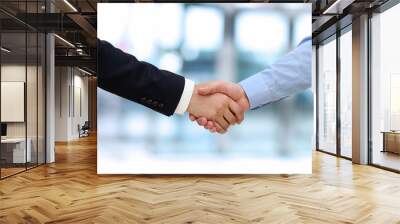 close-up image of a firm handshake between two colleagues in of Wall mural