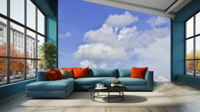 Blue sky background with clouds Wall mural