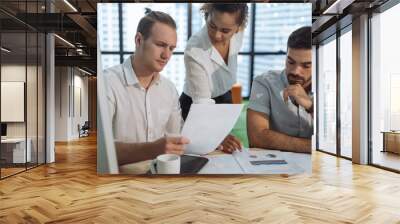 Business people are meeting in office city building view. Group of Business team working and share ideas about project to partners Wall mural