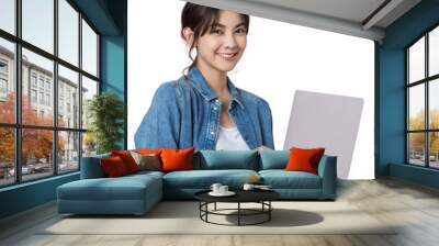 Young Asian college student working with a laptop computer, looking directly at the camera in a studio isolated background Wall mural