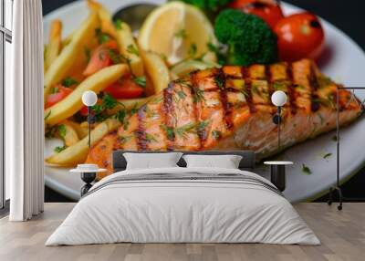 Grilled salmon  French fries and vegetables Wall mural