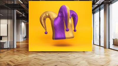 Purple and gold jester hat floating on a yellow background, 3d render Wall mural