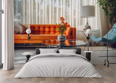 chrome and glass coffee table and orange sofa in a modern living room Wall mural