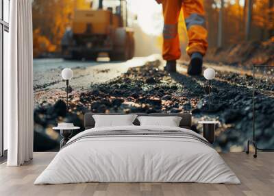 Asphalt renewal services, construction worker overlooking reconstruction site with road roller in the background, close-up with copy space Wall mural