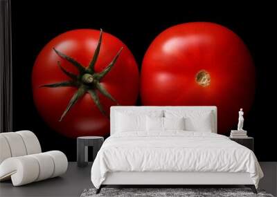 Two tomatoes isolated on black background. Generative ai Wall mural