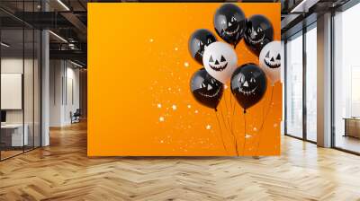 Funny Balloons for Halloween party on orange background Wall mural