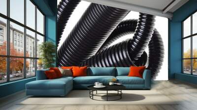 Black plastic corrugated pipe isolated on white background Wall mural