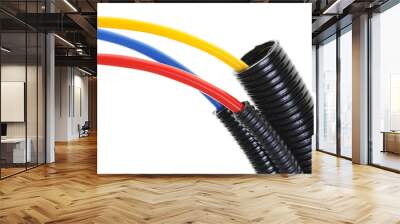 Power supply cables in corrugated pipe isolated on white  Wall mural