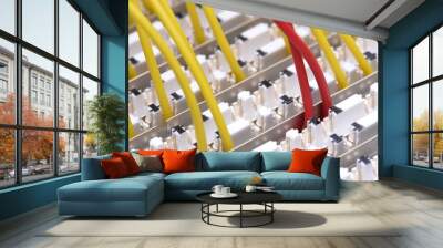 Telecommunication main distribution frame with colorful cables, close up Wall mural