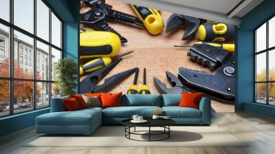 Tools for electrical installation on wooden board  Wall mural