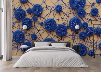 Indigo dots linked by periwinkle threads on a tan background, central text space Wall mural