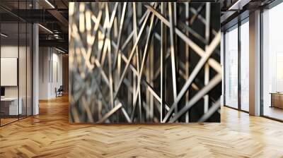 modular fence with thin metal rods arranged in a random, intersecting pattern, creating an abstract and dynamic visual barrier Wall mural