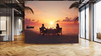 A couple shares a romantic dinner on the beach, enjoying the sunset with a beautiful ocean view and palm trees surrounding them Wall mural