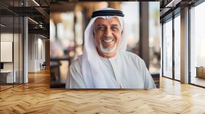 portrait of senior old arab man in dubai wearing white arabic clothes Wall mural