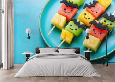 Spooky Halloween fruit skewers with playful bat and ghost designs Wall mural