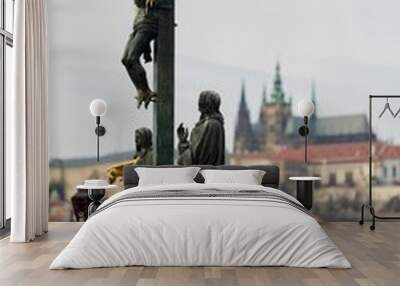 Closeup vertical shot of the Statue of the crucifixion of Christ on Charles Bridge, Prague Wall mural