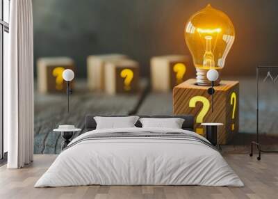 A glowing light bulb sits atop a wooden block with a question mark, illuminating the path to finding answers. Wall mural