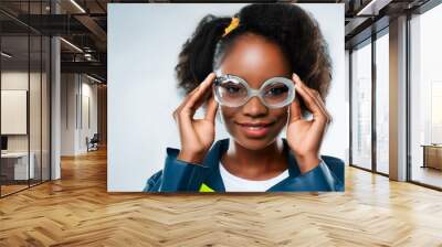 African American woman donning safety glasses. Wall mural