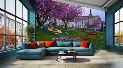 Barnsley Town Hall Memorial Garden with Spring Vibrant Flowers During Blue Hour . High quality photo Wall mural