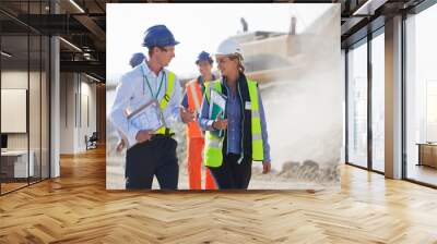 Business people talking in quarry Wall mural