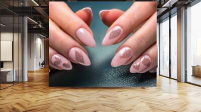 female hands with beautiful long nails with manicure with heart pattern Wall mural