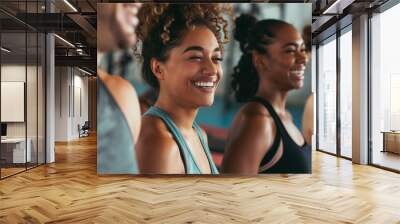 Fitness, laughing and friends at the gym for training, diverse pilates class for active healthy lifestyle. exercise in a group for a workout, cardio or yoga in a studio  Wall mural