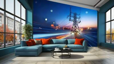 high voltage tower and power lines with abstract defocused city lights at night transmission of electricity for urban life Wall mural