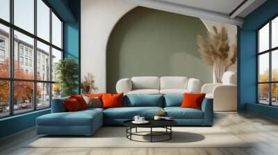 Modern living room interior with a white sofa, armchair, and two wooden coffee tables in front of a sage green wall. Wall mural