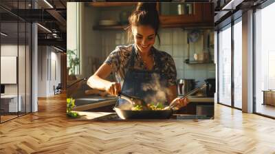 young woman  cooking in kitchen Wall mural