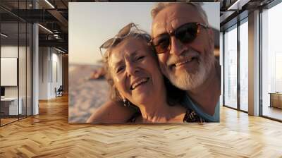 senior couple smiling for the camera while on vacation Wall mural