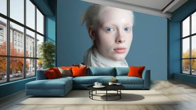 studio portrait of albino woman with blue eyes Wall mural