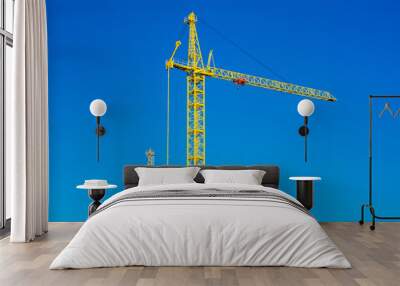 two cranes on construction site. Wall mural