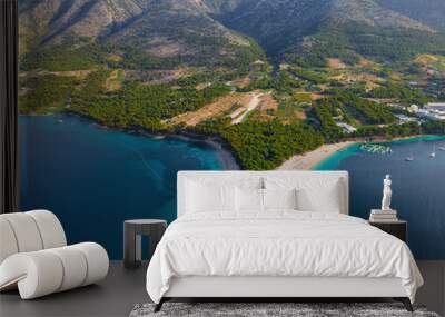 Aerial view of the Zlatni Rat sandy beach, sea and mountains on Brac island, Croatia made with drone Wall mural