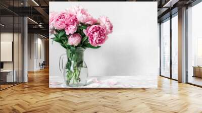 beautiful bouquet of pink peony flowers in vase. womans day or wedding background with copy space Wall mural