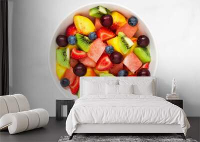 Bowl of healthy fresh fruit salad on white marble background. healthy food Wall mural