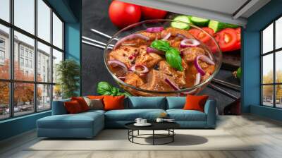 Raw beef or pork meat marinated. Raw kebab or shashlik in spices on black background. Cooking food for bbq Wall mural