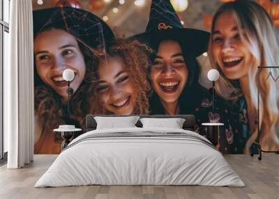 A group of female friends enjoying a Halloween-themed game night. Wall mural