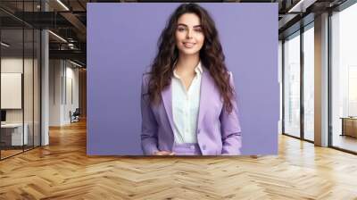 Portrait of a business woman in purple suit in office background Wall mural