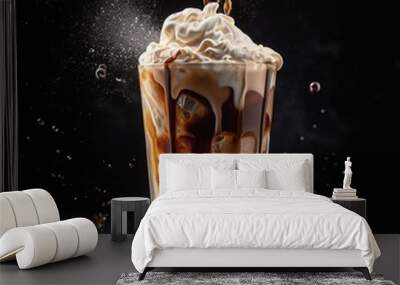 Iced caramel coffee with whipped cream and coffee beans on black background Wall mural