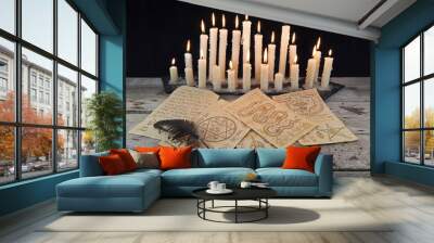 Magic papers with candles and quill Wall mural