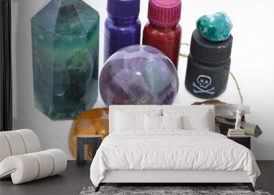 Magic stones with bottles and old key isolated Wall mural